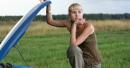 woman waiting for help on side of road